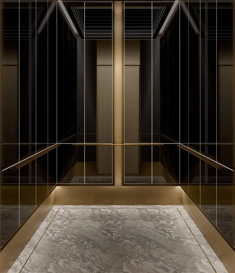 Black glass and brass cabin with a grey marble floor